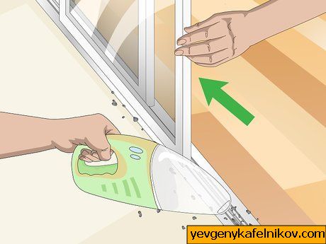 Како очистити клизне стаклене стазе на вратима